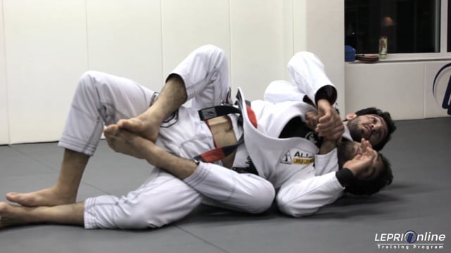 Seatbelt Back Take when an Opponent Defends by Rolling