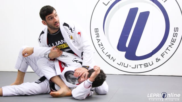 Headlock Escape on the Ground to Armbar