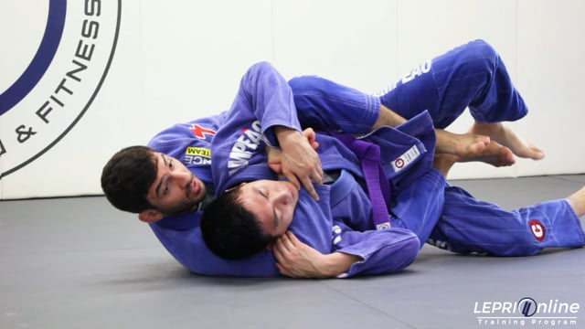 Seatbelt Back Take when a Turtled Opponent Attempts to Establish Guard