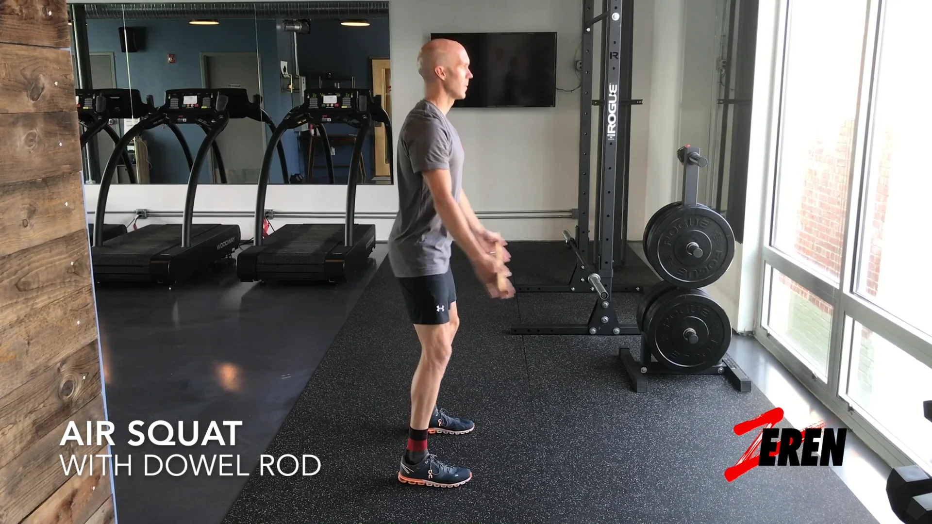 Air Squat with Dowel Rod