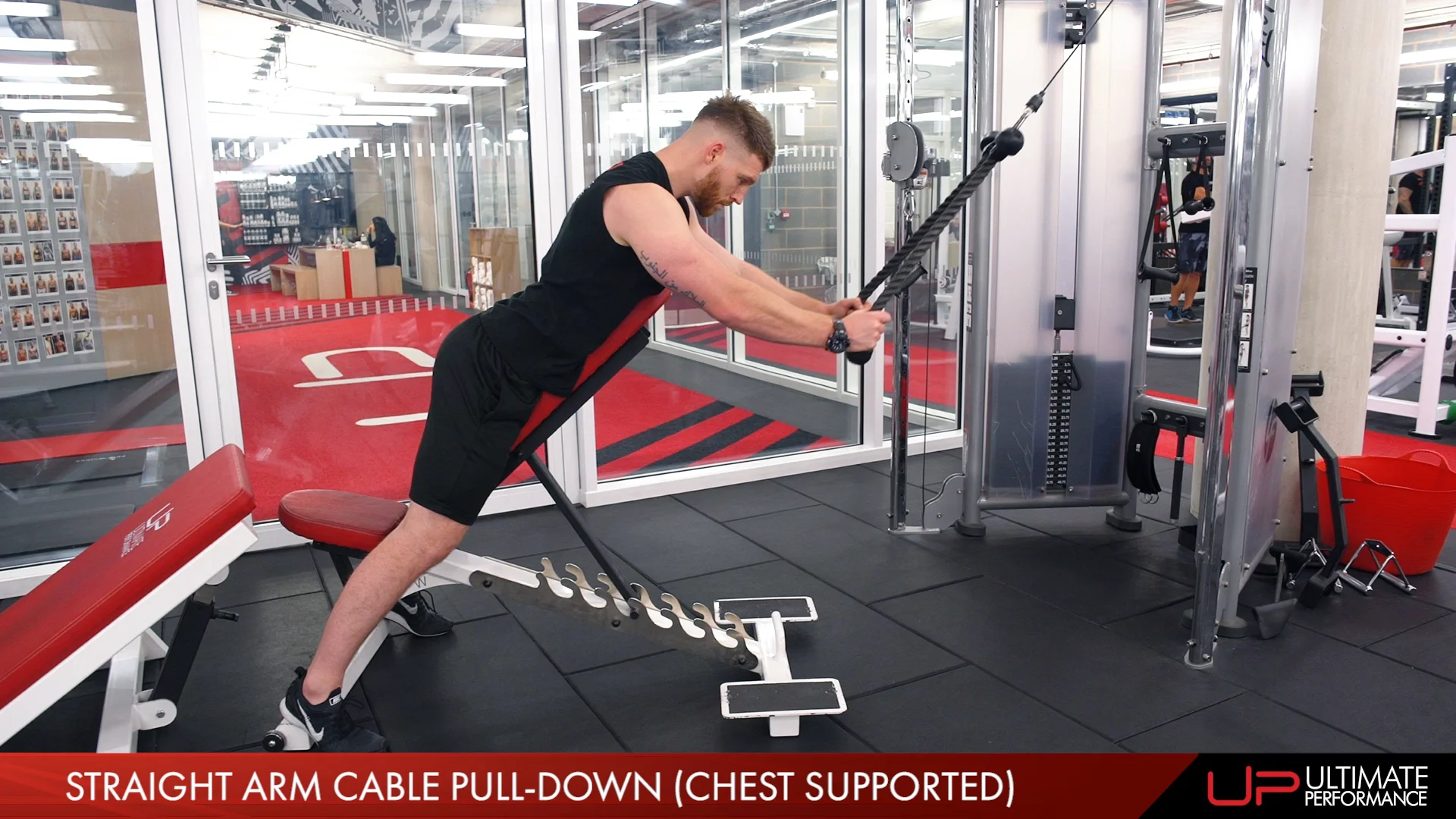 Straight arm cable pull down chest supported