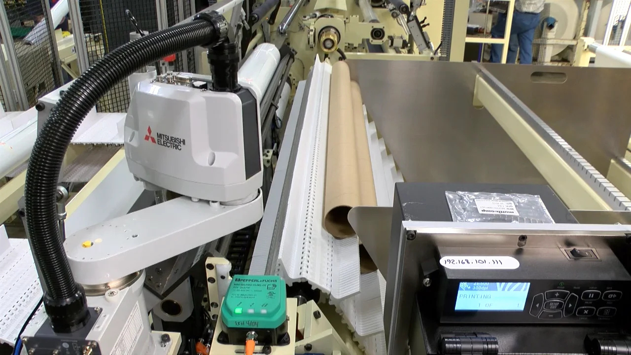Robotic Core ID Label Applicator on Vimeo