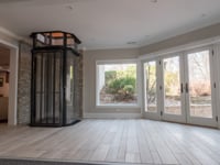 Panoramic glass home elevator SAVARIA VUELIFT ROUND by Garaventa Lift