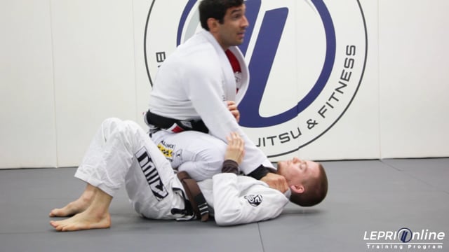 Foot on the Hip Fake While Standing to De la Riva Sweep to Mount