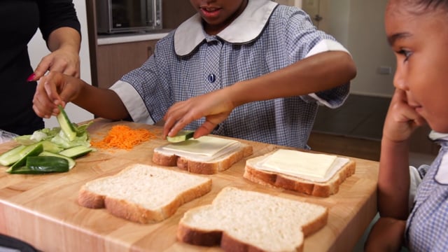 Preparing healthy lunch boxes together