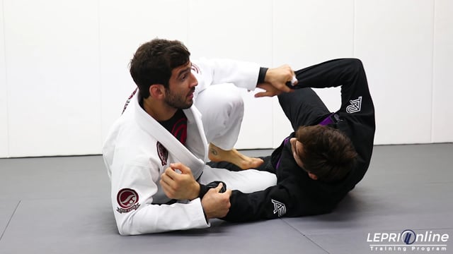 De La Riva to Sit Up Sweep with Foot on Bicep and Lapel Grip to Combat Base Position