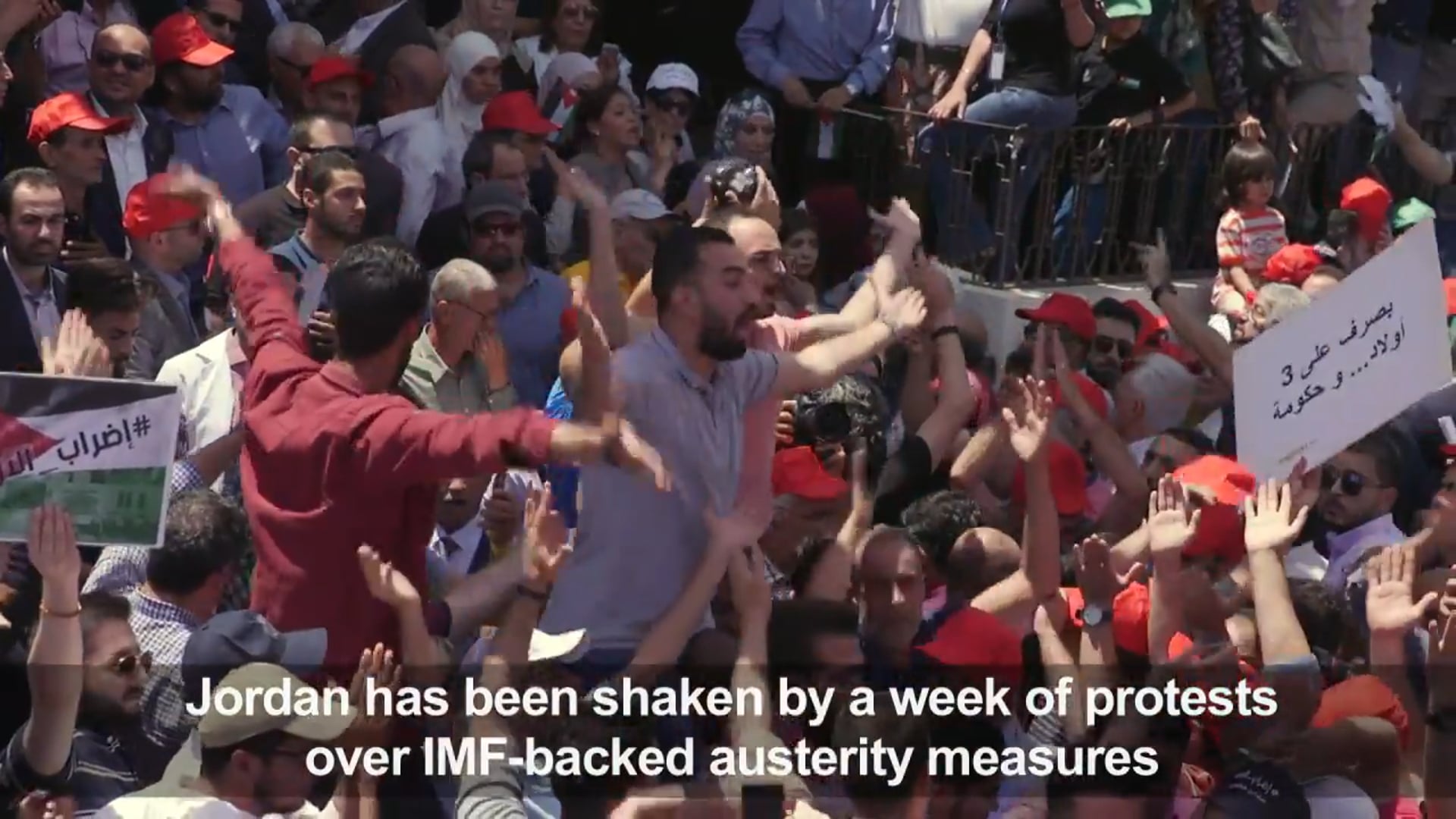 Jordanians protest in capital Amman amid strike over tax bill