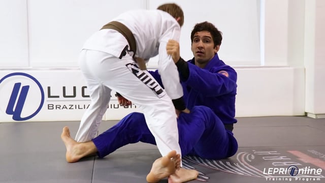 Open Guard Pass Defense to the Dummy Sweep