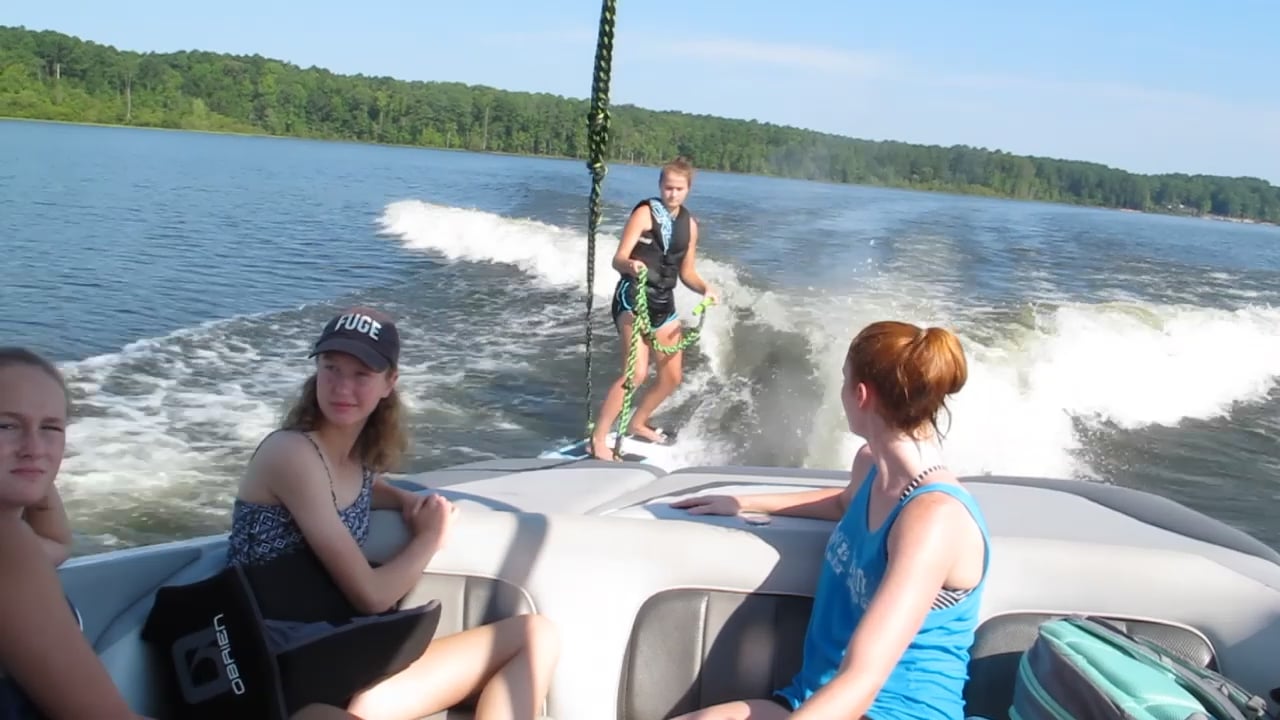 Aija learning to wake surf