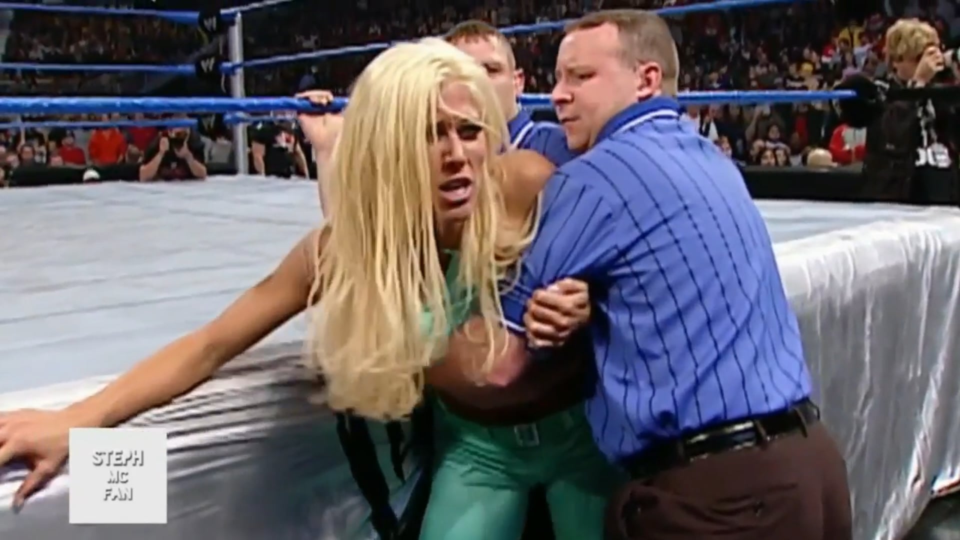 Torrie Wilson B00bs Grabbed. Referee stops her brawl with Dawn Marie (Smackdown 12-16-2002)