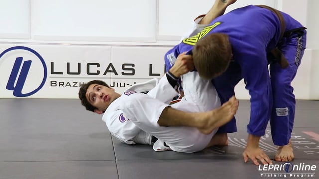 De La Riva to Omoplata Submission When Opponent Attempts Knee Cut