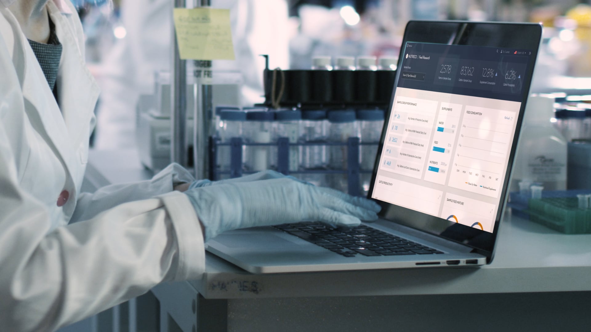 Person working on laptop in a lab