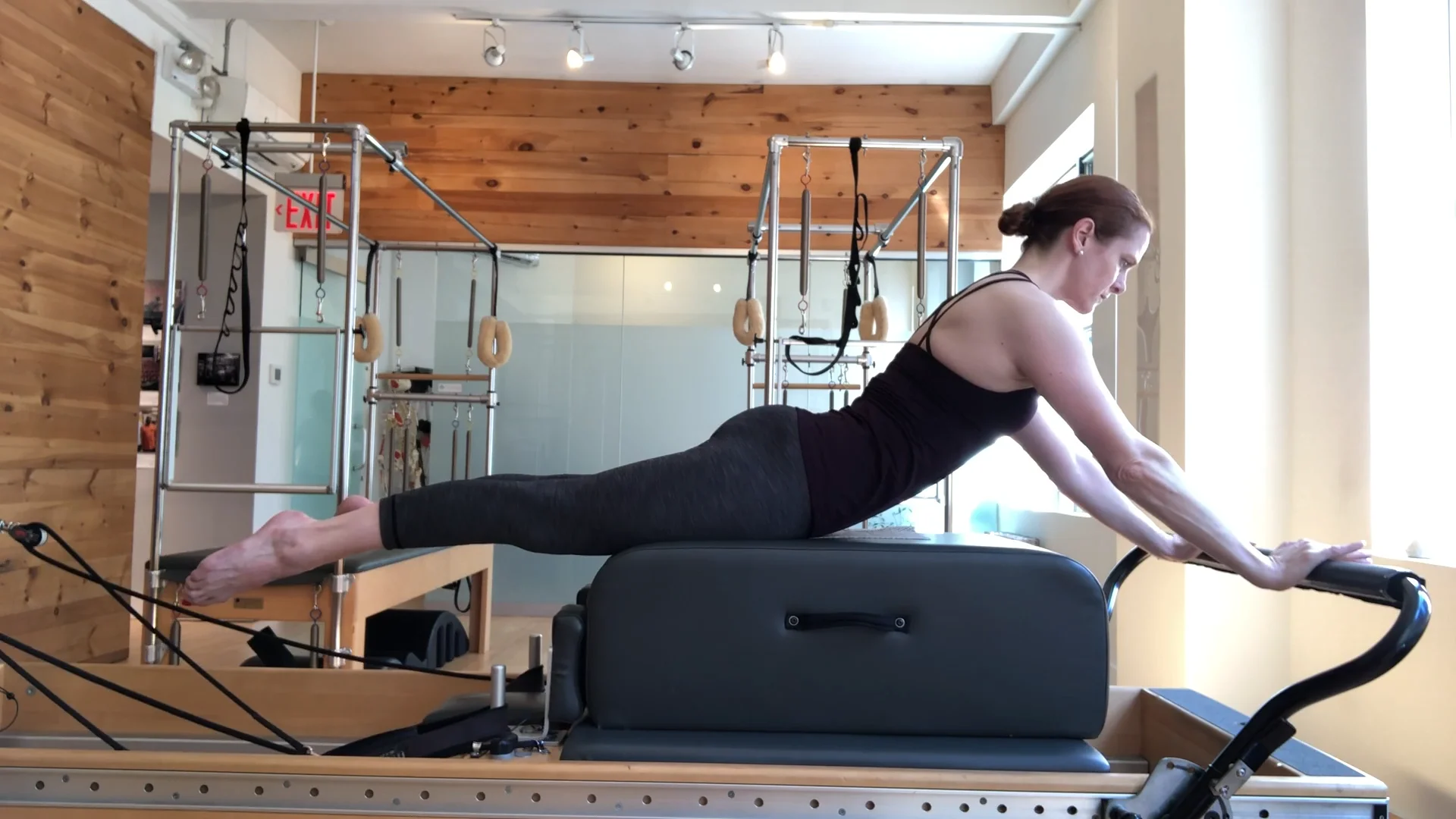 Plow on Long Box on Pilates Reformer 