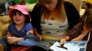 Heidi looks at book about thunder thumbnail