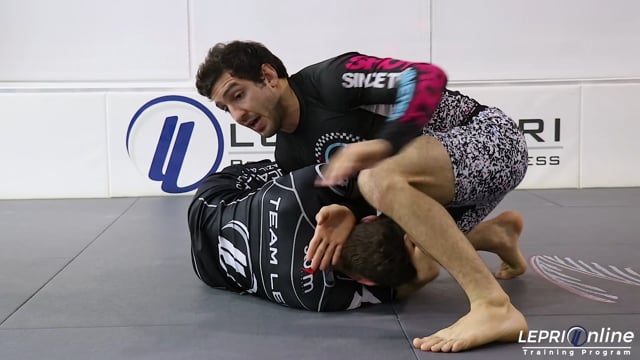 Triangle Submission from the Side Control when Opponent Tries to Escape