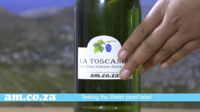 Waterproof Bottle Labels on Wine Bottle Demonstrated by Label Paper and V-Auto Label Cutting Machine