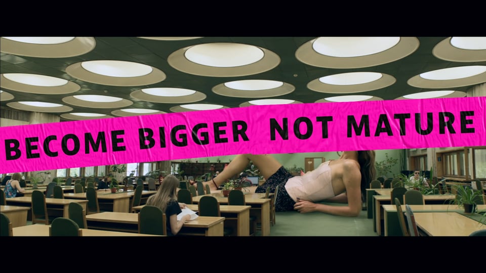 Become bigger.  Not mature