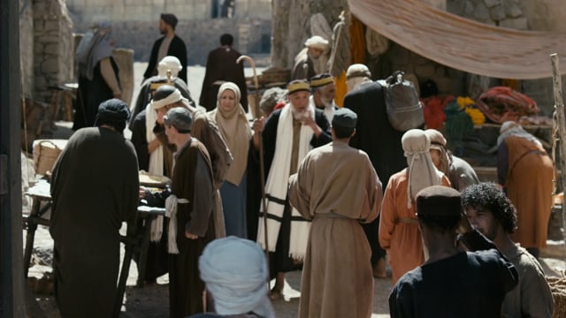 Jesus teaching among the people in city