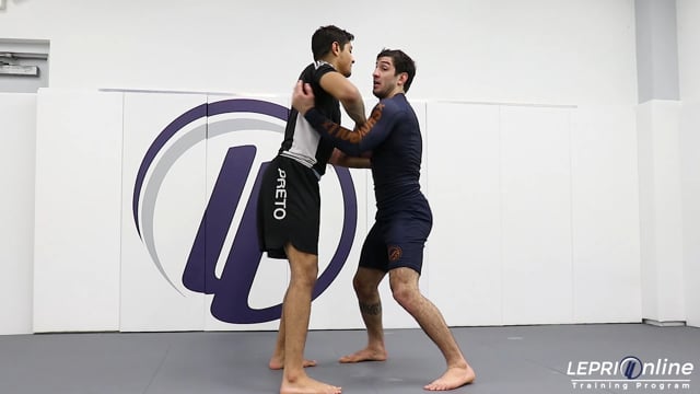 Under Hook Pummeling to Ouchi Gari Takedown