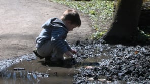 Playing with mud thumbnail