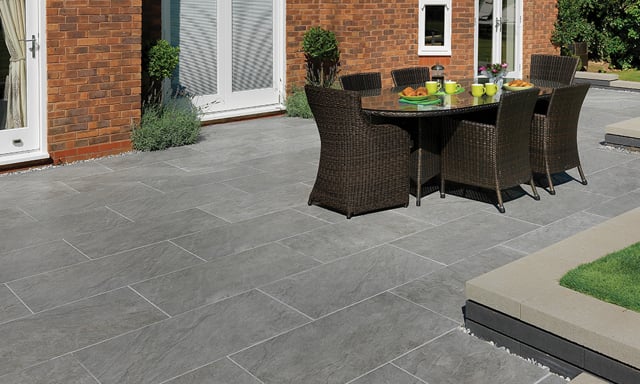 Pavestone - Pavestone Natural Greystone Porcelain Patio Paving on Vimeo