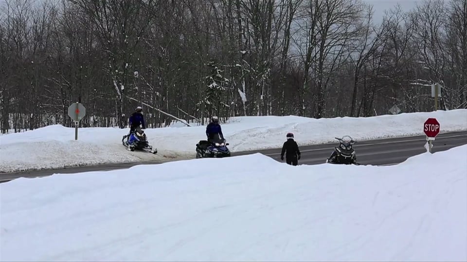 Crossing a Street on a Snowmobile video