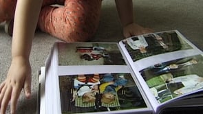 Joanne looks at photos thumbnail