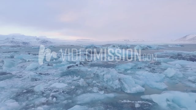 Drone Flying Over Icebergs