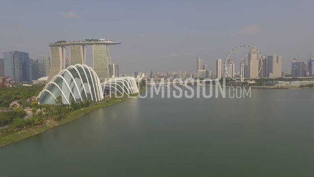 Drone Flying Over River Near Dowtown Singapore