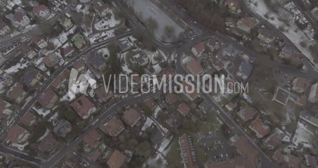 Drone Panning Up From City To Distant Castle