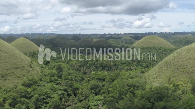 Drone Slowly Flying Away From Island Jungle