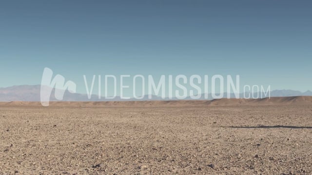 Back Shot Of Men Walking In The Distance