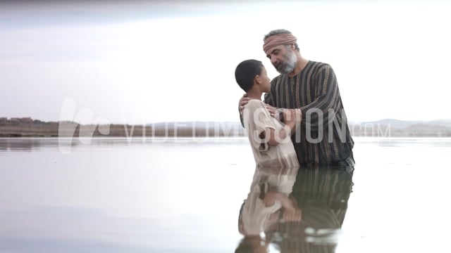 Baptizing Young Boy In The River