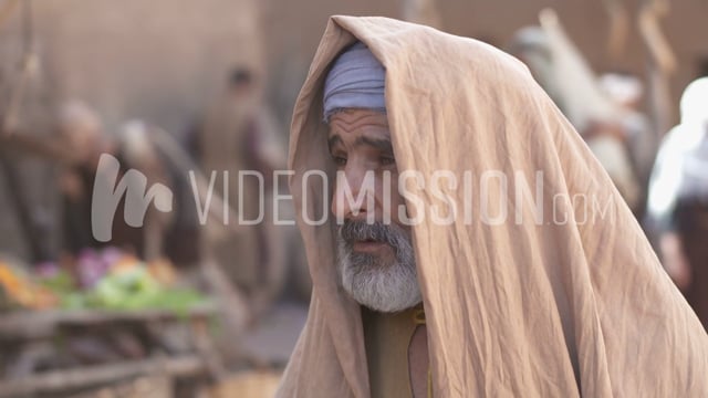 Close Up Sliding Shot Of Older Man Talking