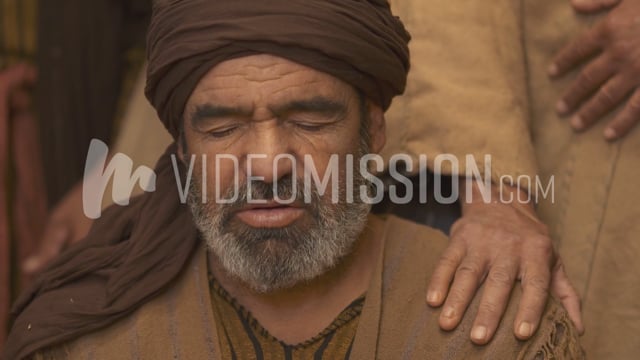 Hand On The Shoulder Of Praying Man