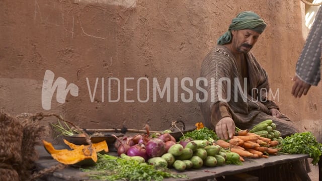 Man Selling Vegetables In The Market