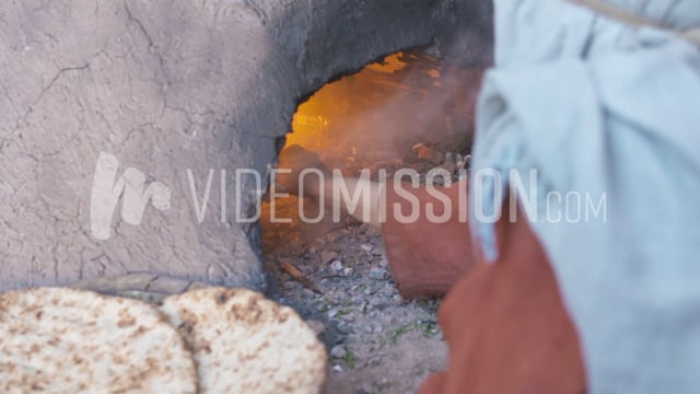 Woman Turns Flatbread In Oven And Pulls Out 3