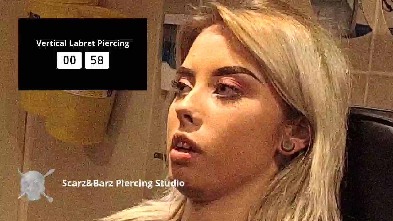 Sophie gets her Vertical Labret pierced Live at Scarz&Barz The Piercing  Studio on Vimeo