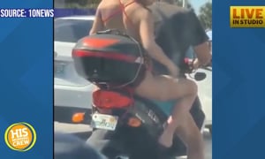 Woman Caught Shaving Legs on the Back of a Motorcycle