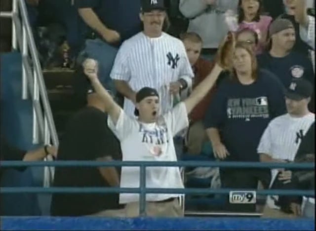 Jason Giambi waves to the crowd while being inducted in the