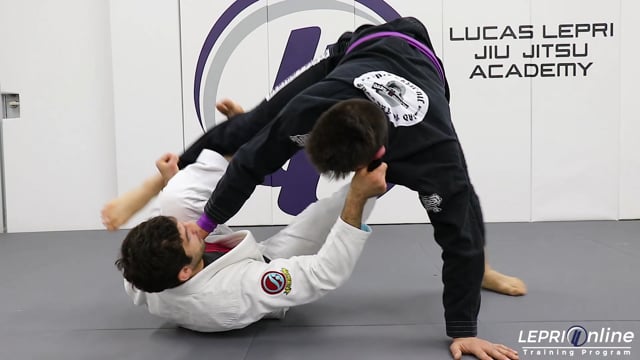 Using De La Riva to Stand Up and Take the Opponent Down