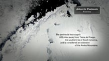 Satellite image of the Antarctic Peninsula. Text at top right reads "Antarctic Peninsula, Antarctica." Text at bottom right reads "The peninsula lies roughly 620 miles away from Tierra del Fuego, the southern tip of South America, and is considered an extension of the Andes Mountains."