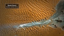 Satellite image of the Namib Desert. A gray box in the top left corner has text that reads "Namib Desert, Namibia, Southern Africa."