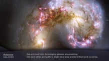 Image of two galaxies colliding. Text at bottom left reads "Antennae, Galaxies." Text at bottom center reads "Gas and dust from the merging galaxies are smashing into each other, giving life to bright blue stars amidst brilliant pink nurseries."
