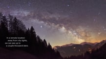 Photo of stars in the Milky Way. Text toward the bottom left reads "In a remote location away from city lights, we can see up to a couple thousand stars."