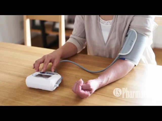 Blood pressure check test monitor exam. Male hand and diagnostic