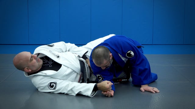 Arm drag from half-guard