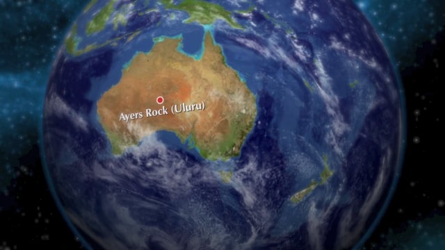 Music of Joy singing "Raining on the Rock" with images of Uluru.