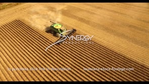 607 Nice aerial drone view soybean harvesting