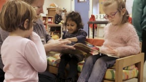 Watch Aziah looks at books